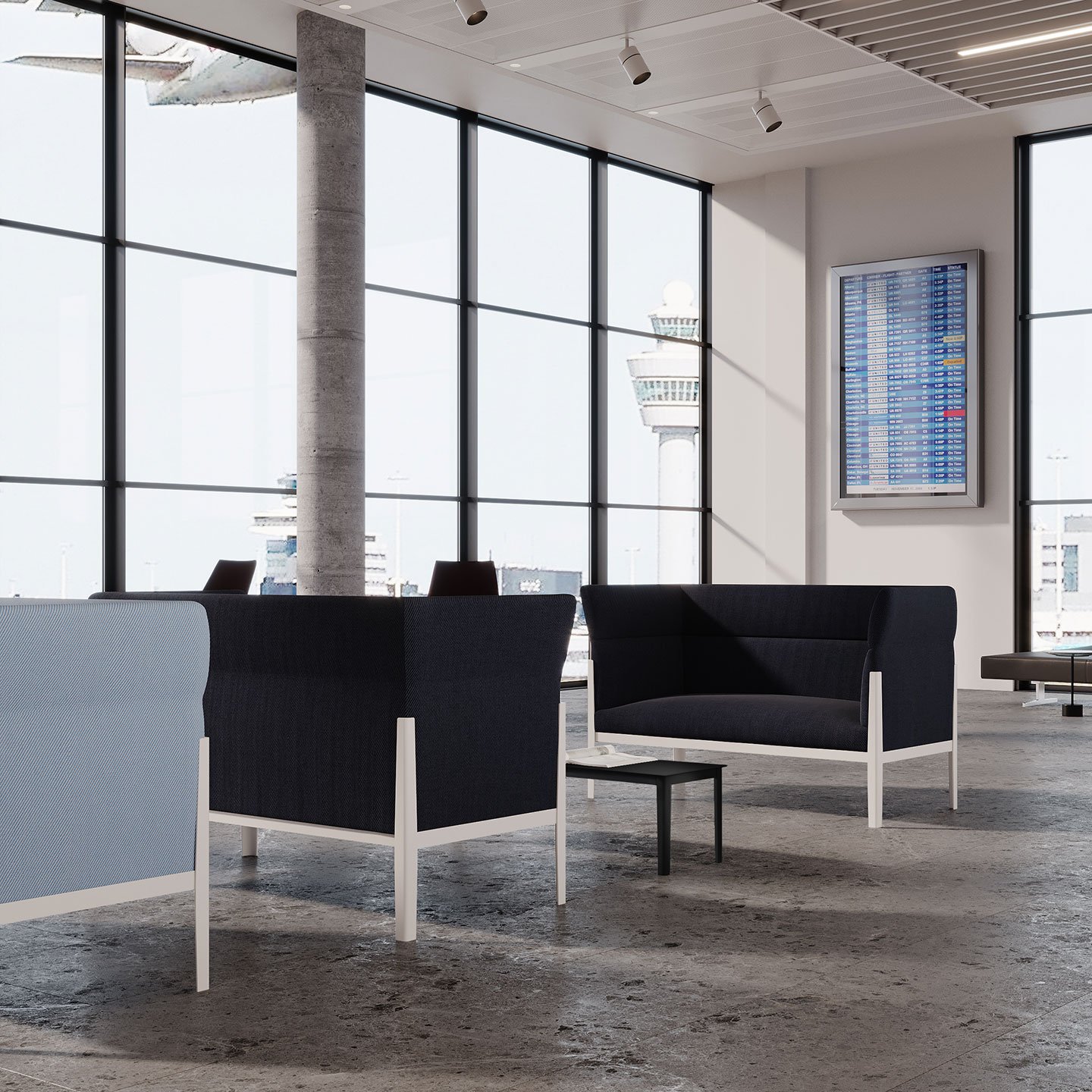 Haworth Cotone Slim lounges in black and light blue suede by the window in a open floor space of an office
