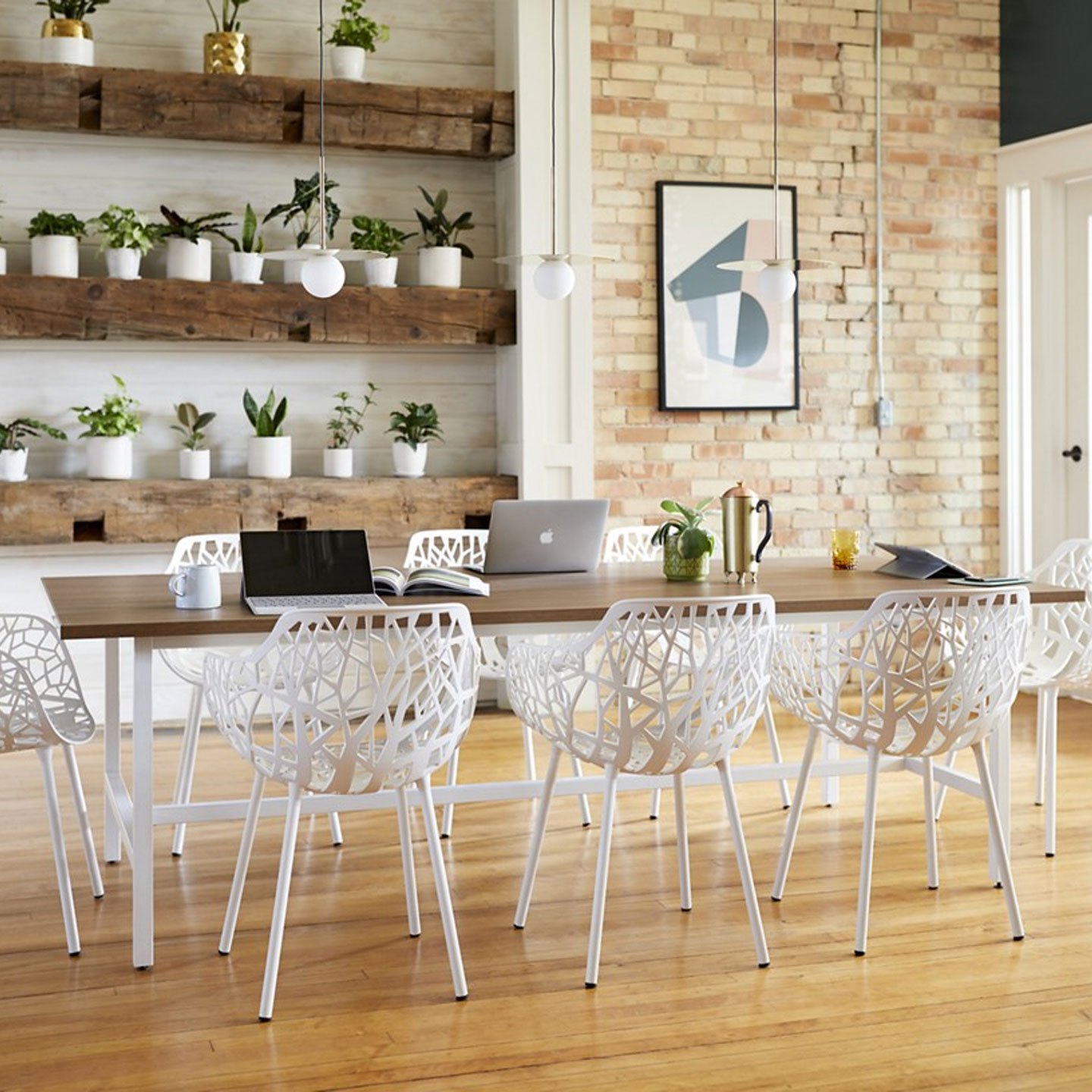Haworth Forest arm chairs in white at table in a casual indoor space