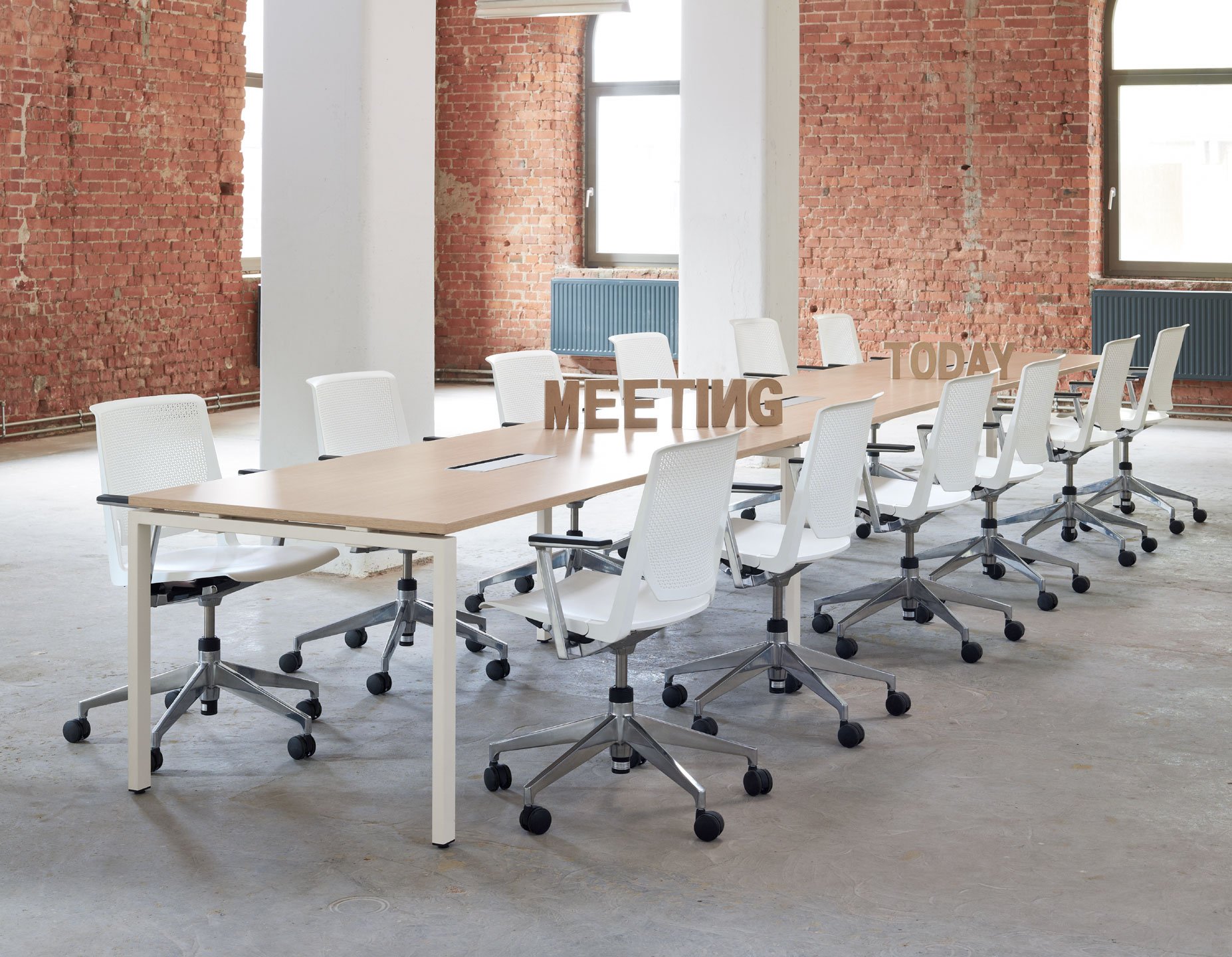 White Very Conference chairs around large conference table