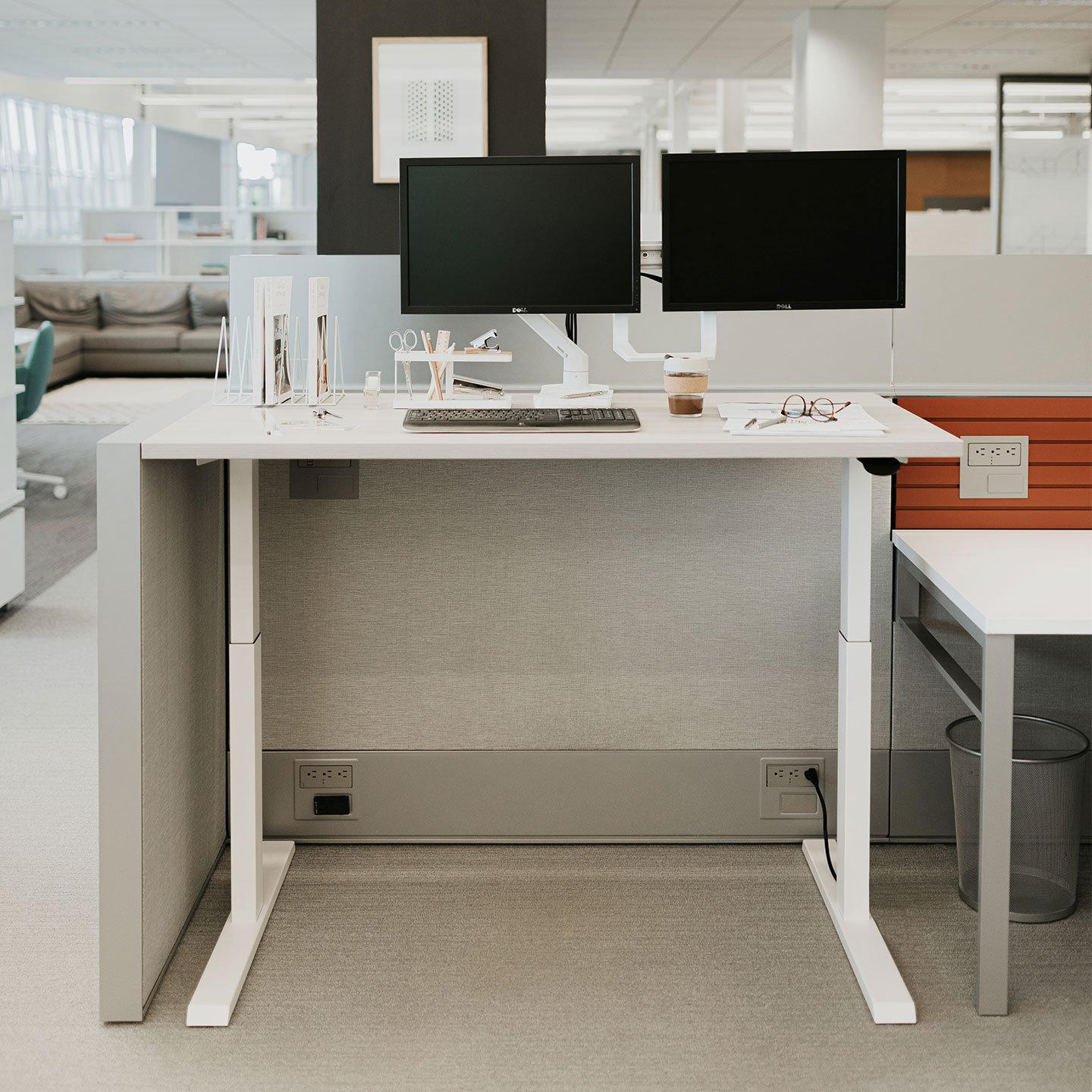 Haworth Upside Height Adjustable Table being used as a desk in an office