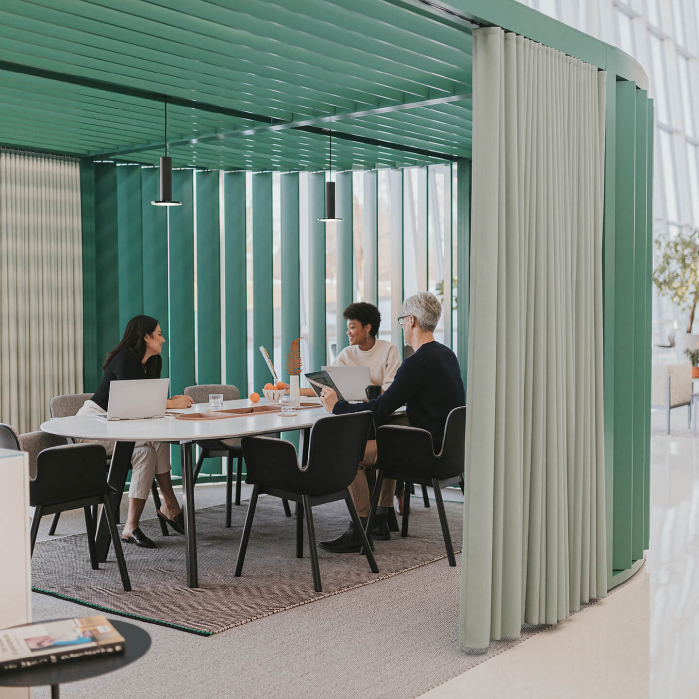 Haworth Julie chairs in black color inside a Pergola workspace view 1