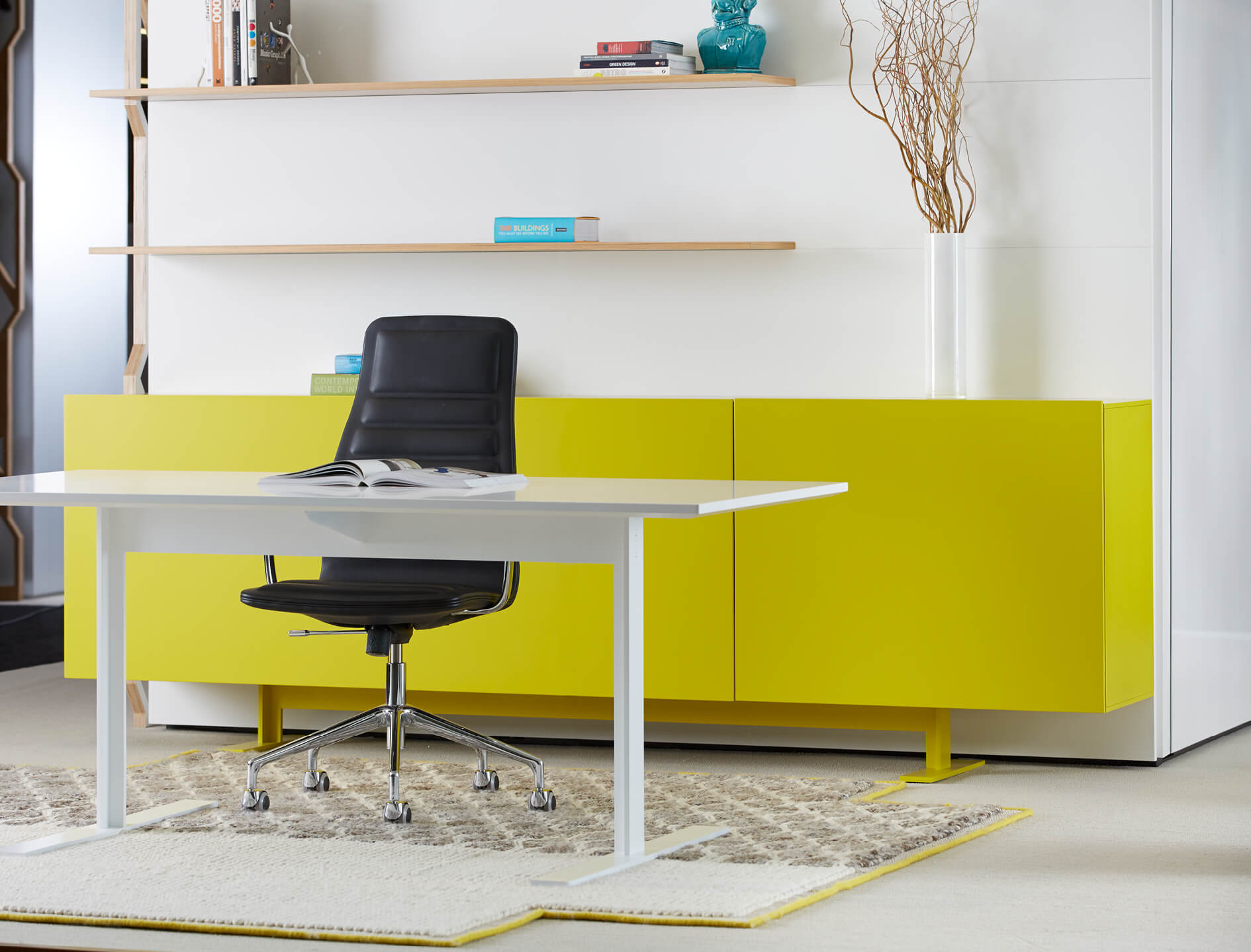 Haworth Giulio Cappellini Designers white table in private office with yellow cabinet behind the desk