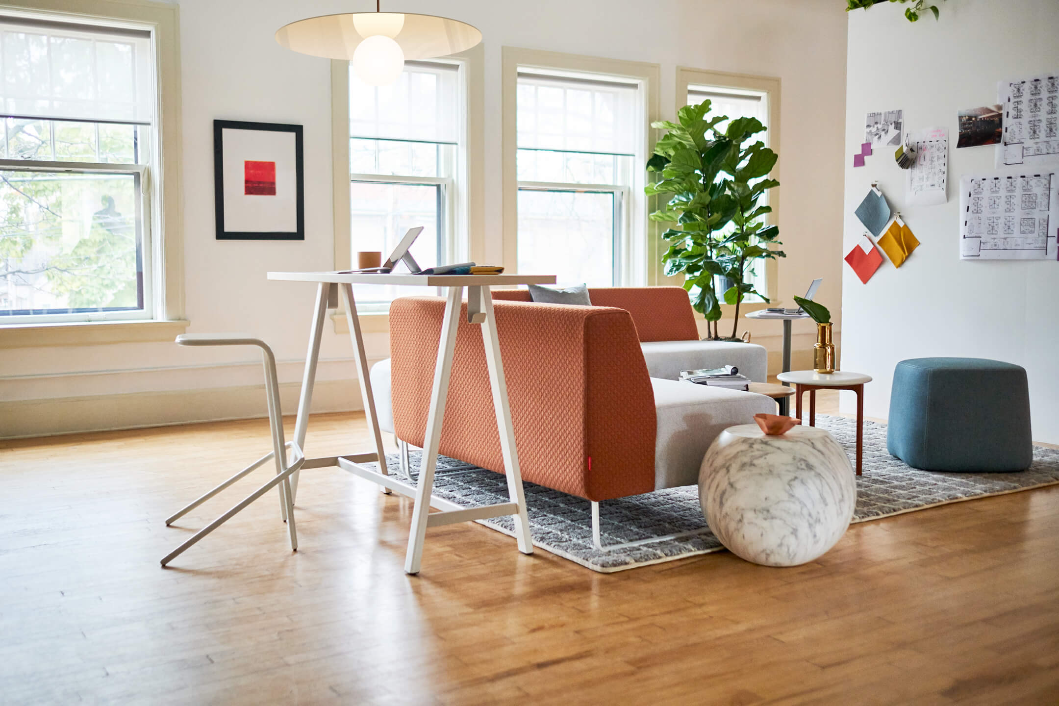 Haworth Giulio Cappellini Designers office collaboration area with tall white table behind couch