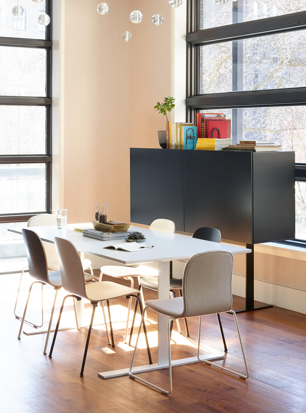 Haworth Giulio Cappellini Designers office private conference room with white table and chairs