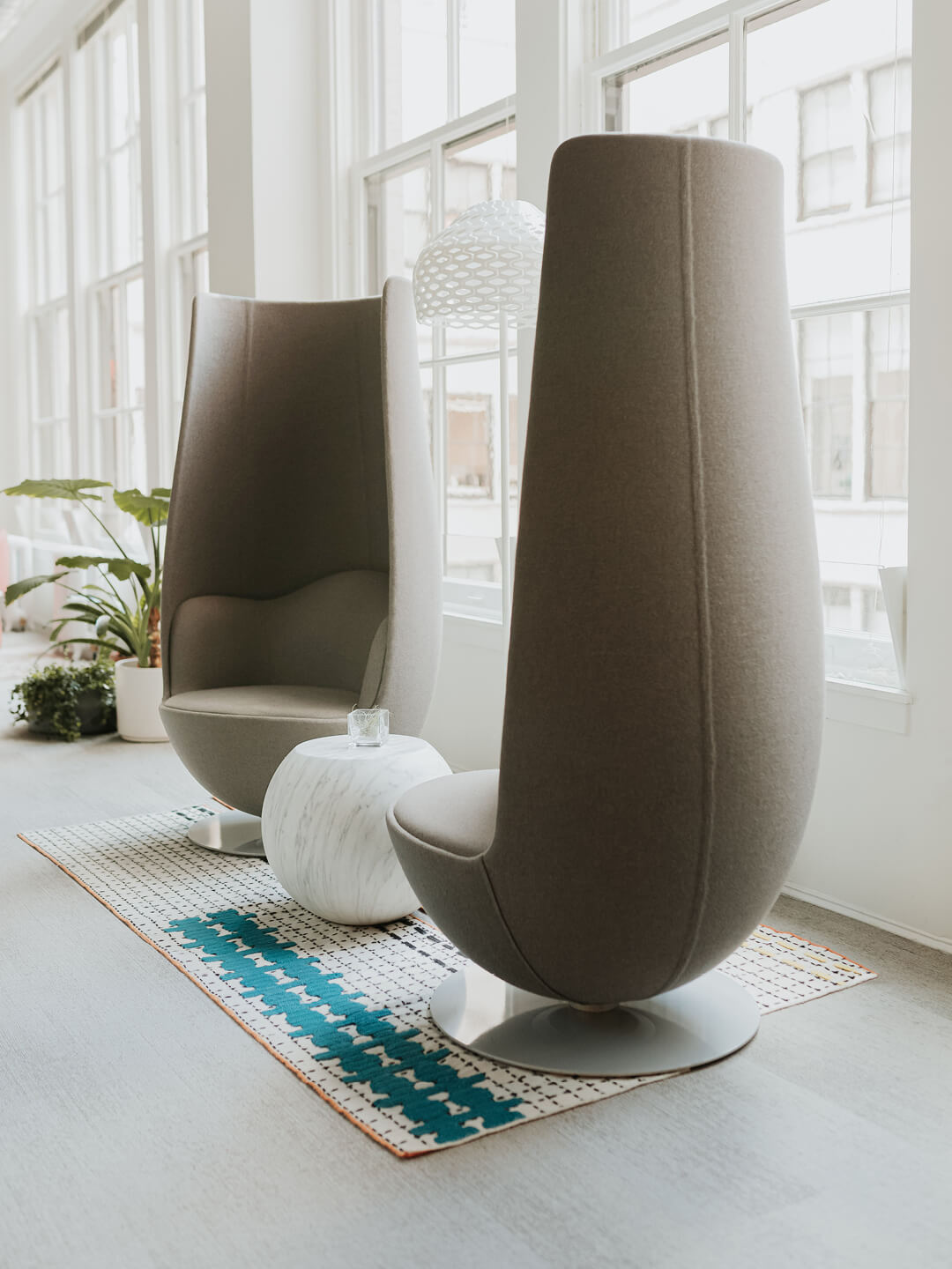 Haworth Marcel Wanders Design in open office space tall chairs and side table