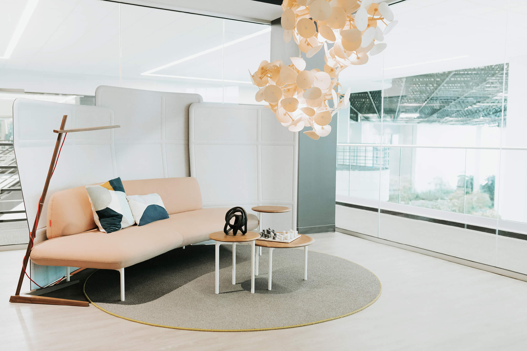 Haworth Patricia Urquiola Designs in private office space with couch and table set up