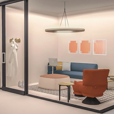 Haworth Ludo lounge chair in orange upholstery in a enclosed space