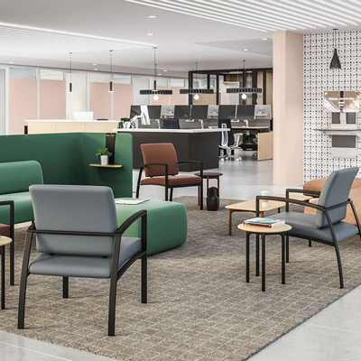 Haworth chairs in grey and green upholstery in a transition space