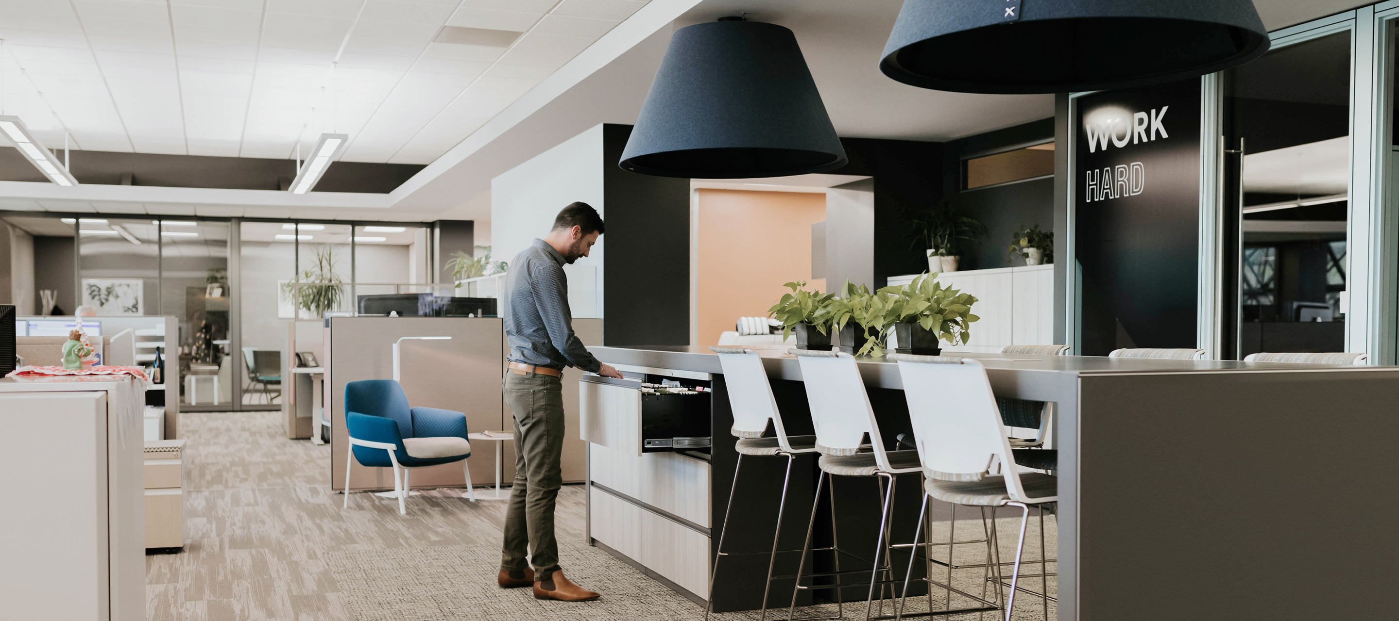 Open office space featuring Buzzishade and the very wire base chair.