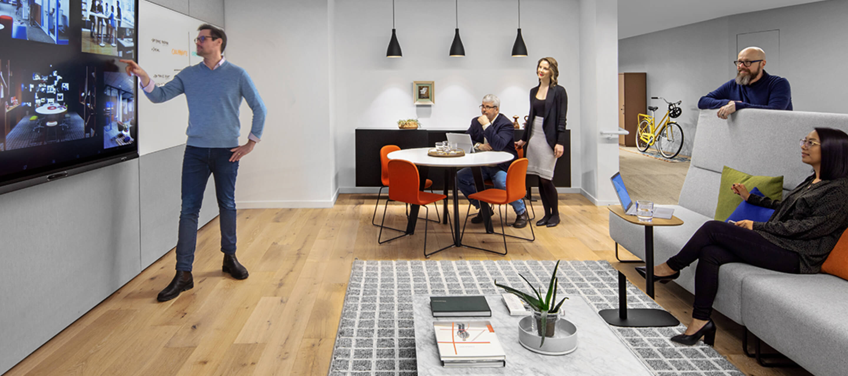 Office collaborative space featuring Immerse table and tate soft stackable side chair.