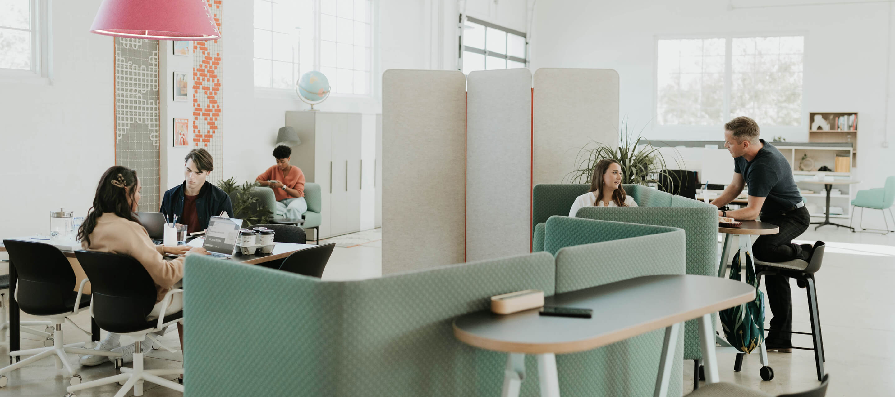 Collaborative work space featuring cabana lounge and popup tables