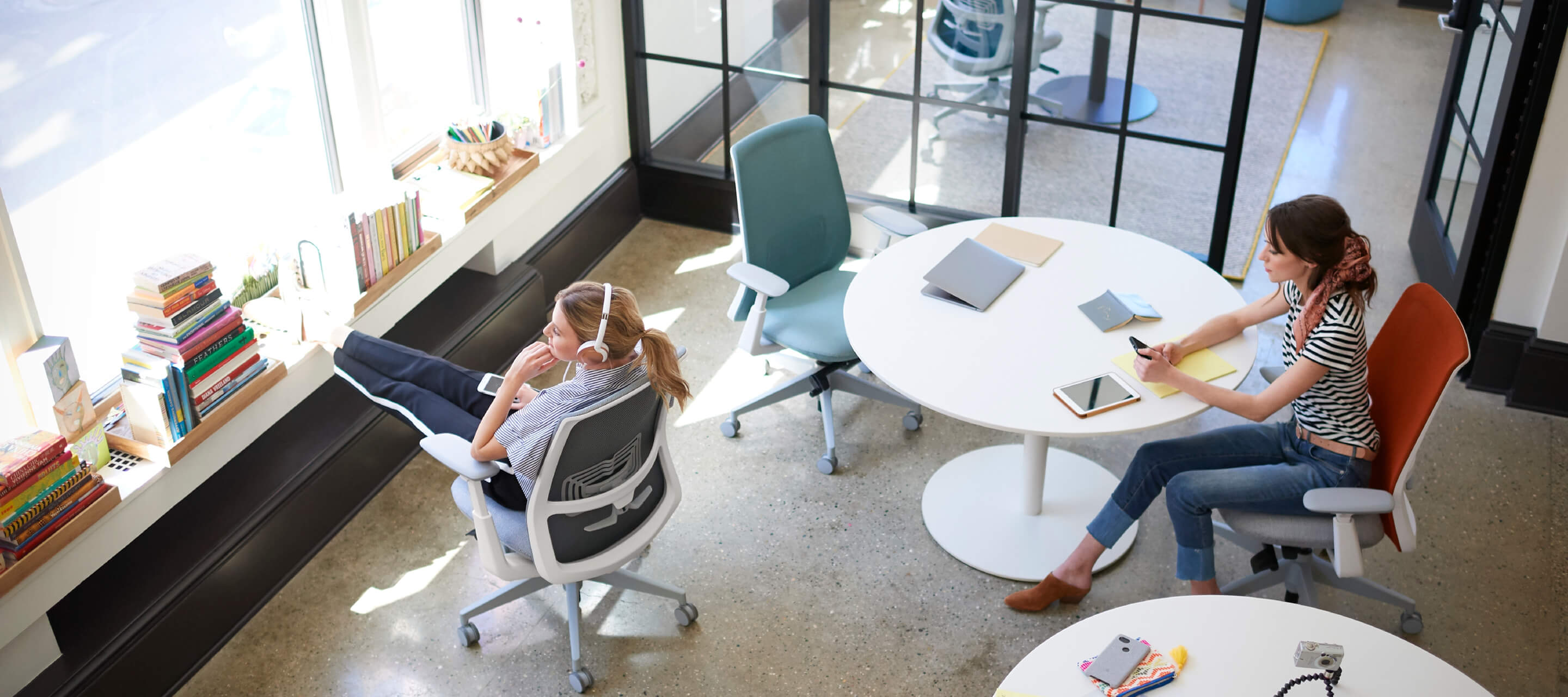 Group work space featuring planes collaborative table and soji