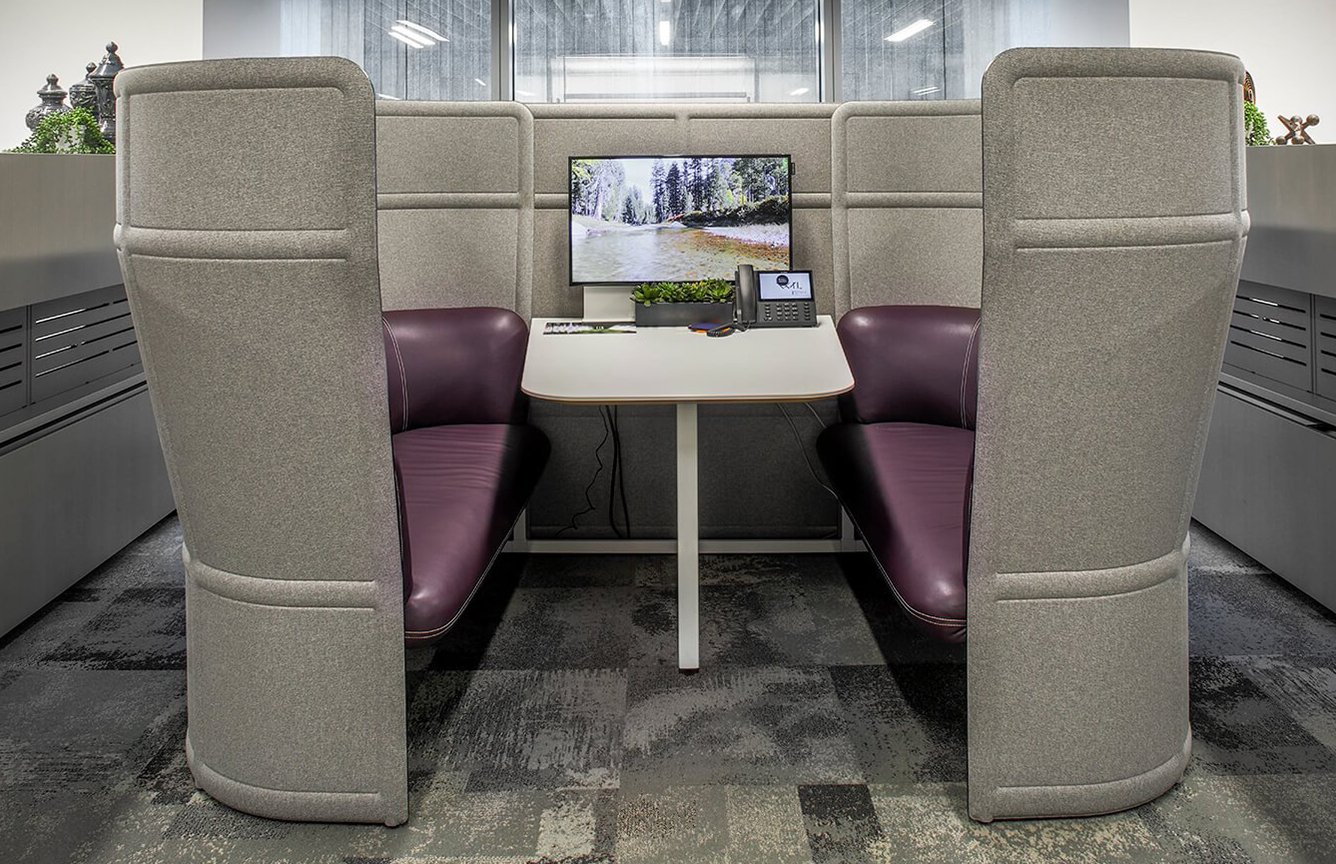 Haworth Cabana lounge with screens in grey and purple upholstery