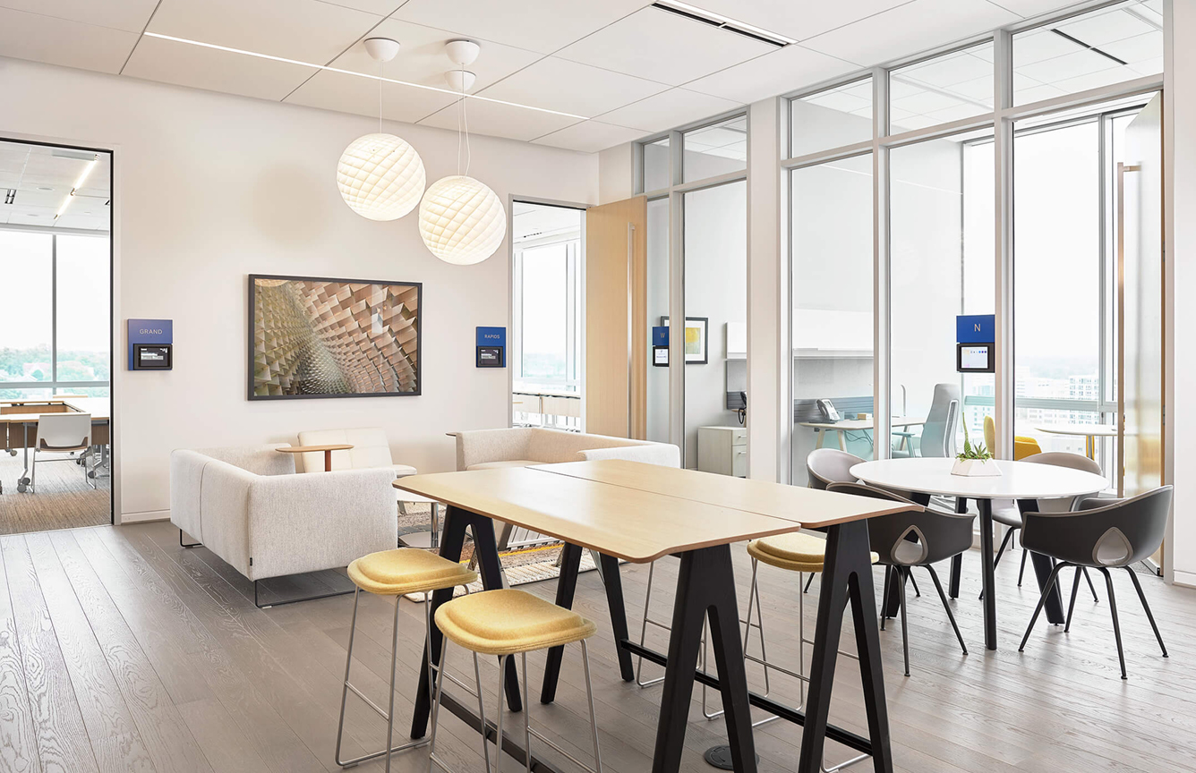 Haworth Hi Pad stools in yellow upholstery with Ginger Ale chairs in a casual space