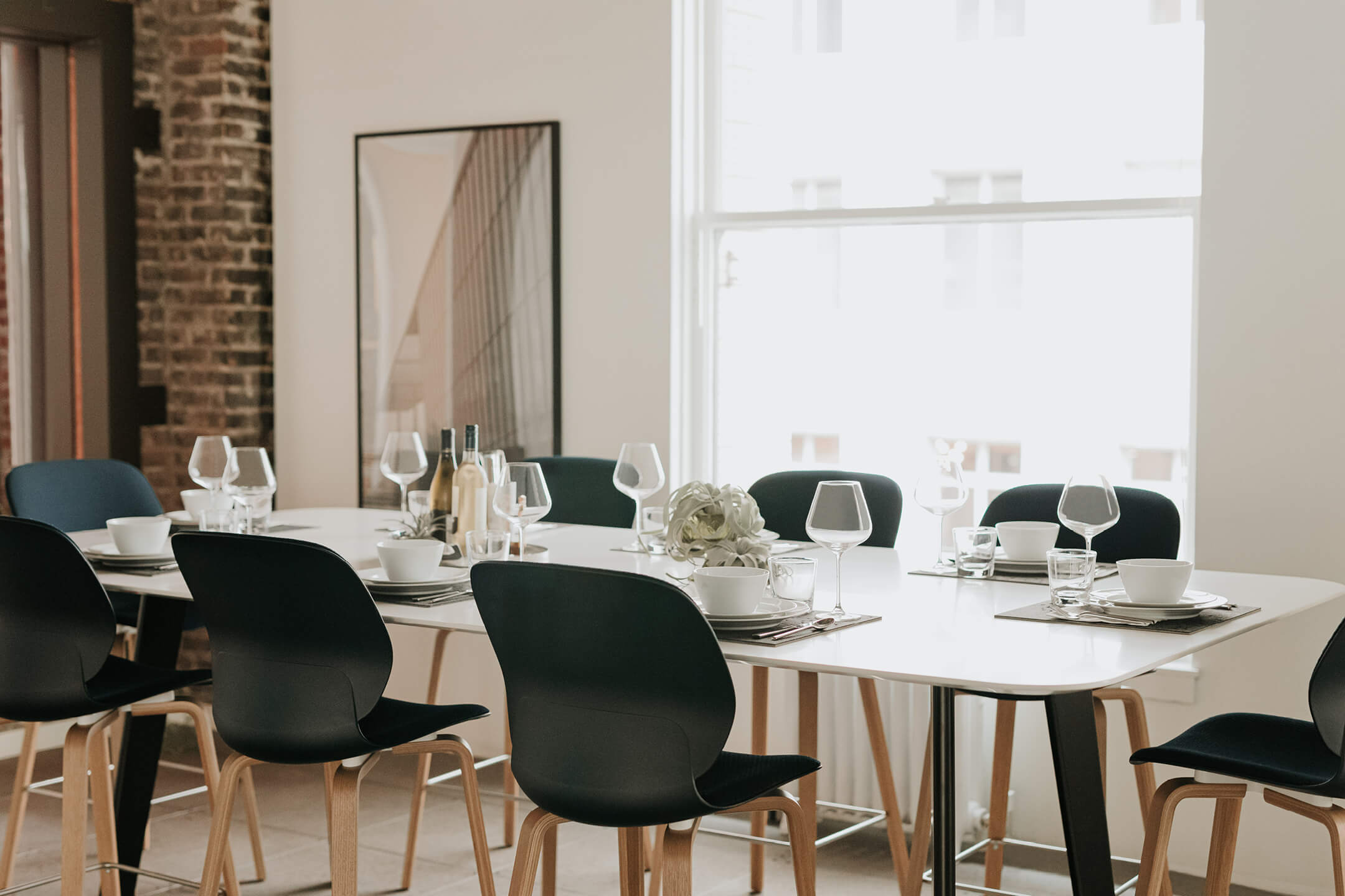 Dining table set with place setting and with Maari chairs 