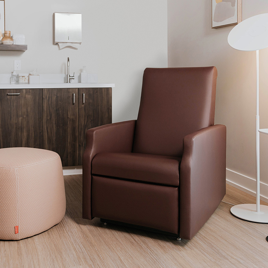 Haworth Benson Recliner in brown leather in a room