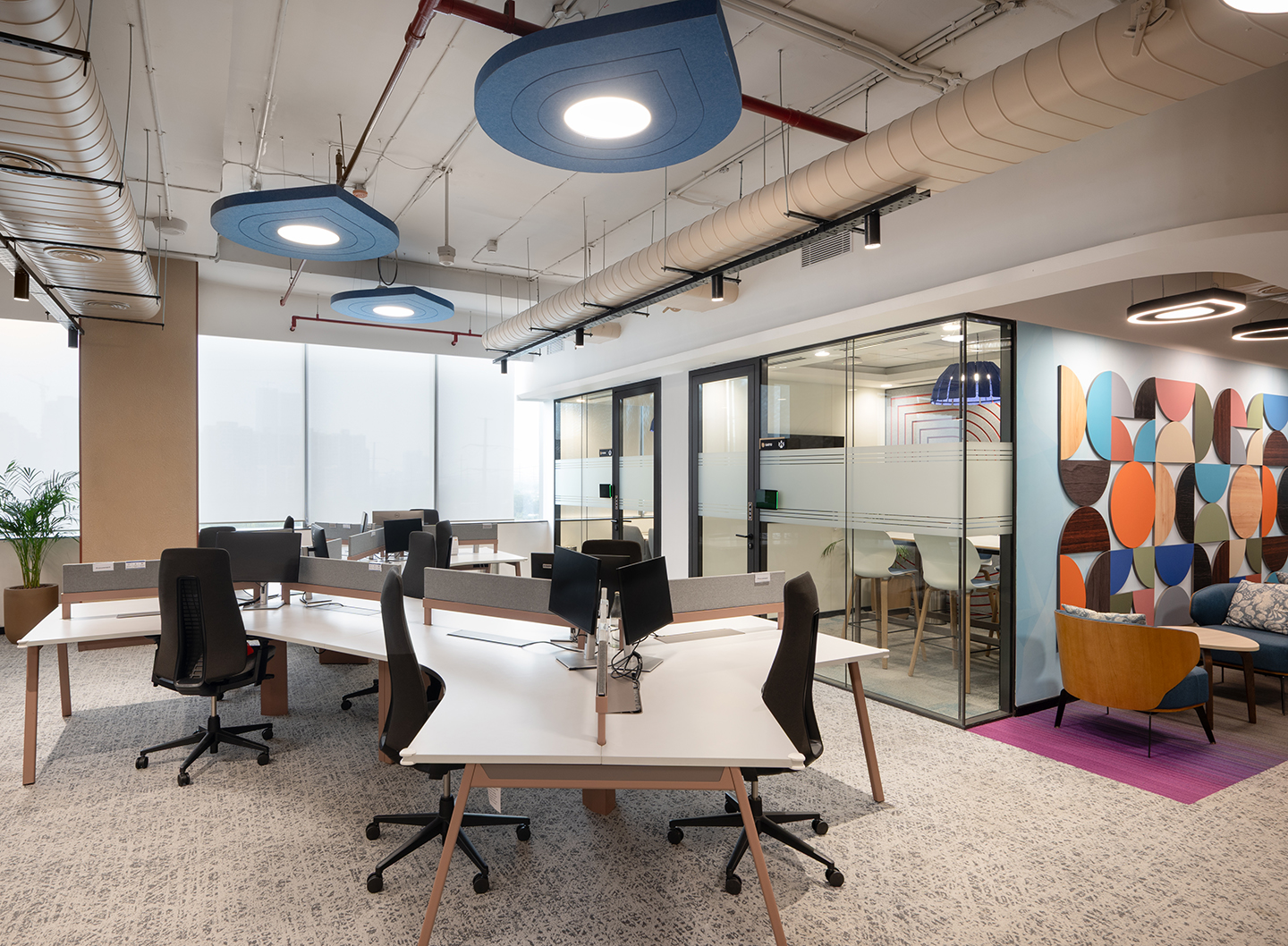 Collaborative zones encourage interaction and offer access to a variety of work settings.