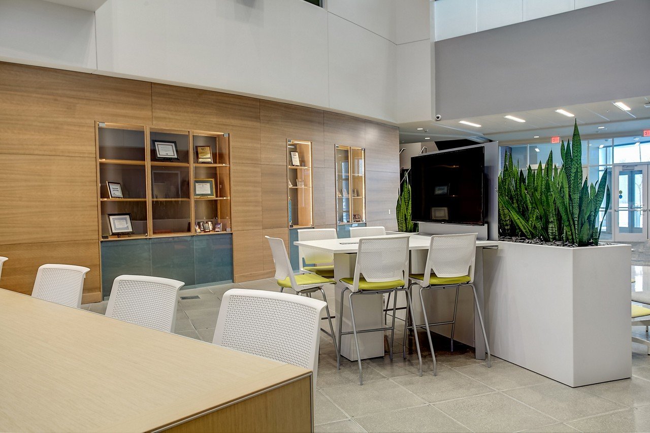 Haworth Very Side high chair in yellow and white  in a library space