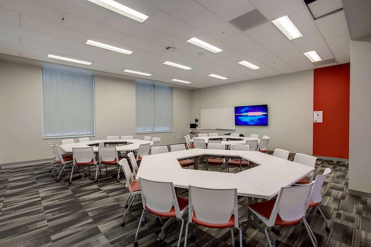 Haworth Very Side & Seminar chair in red and white in a conference room