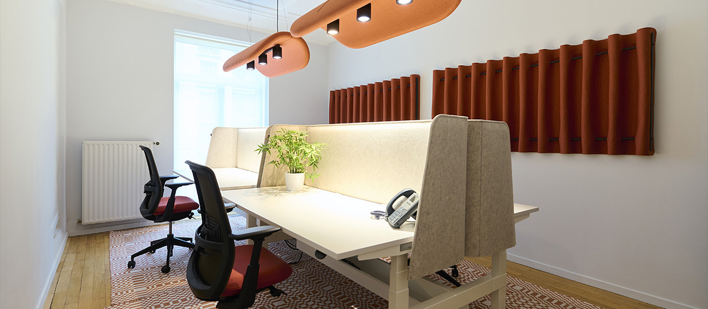 The main goal of the renovation was to address the acoustic difficulties caused by the tall ceilings and wooden floors. Ergonomic furniture and acoustic solutions, combined with thoughtful planning and design, create a conducive and productive work environment that harmonises with the space.