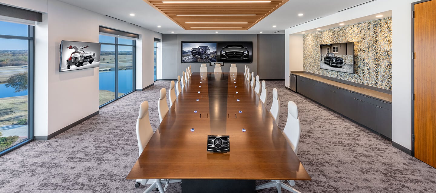 The impressive conference room provides space to invite over 20 people to attend executive-style meetings. The technology-forward design allows easy access to power in any location, and the ergonomic seating provides optimal comfort to enhance productivity. 
