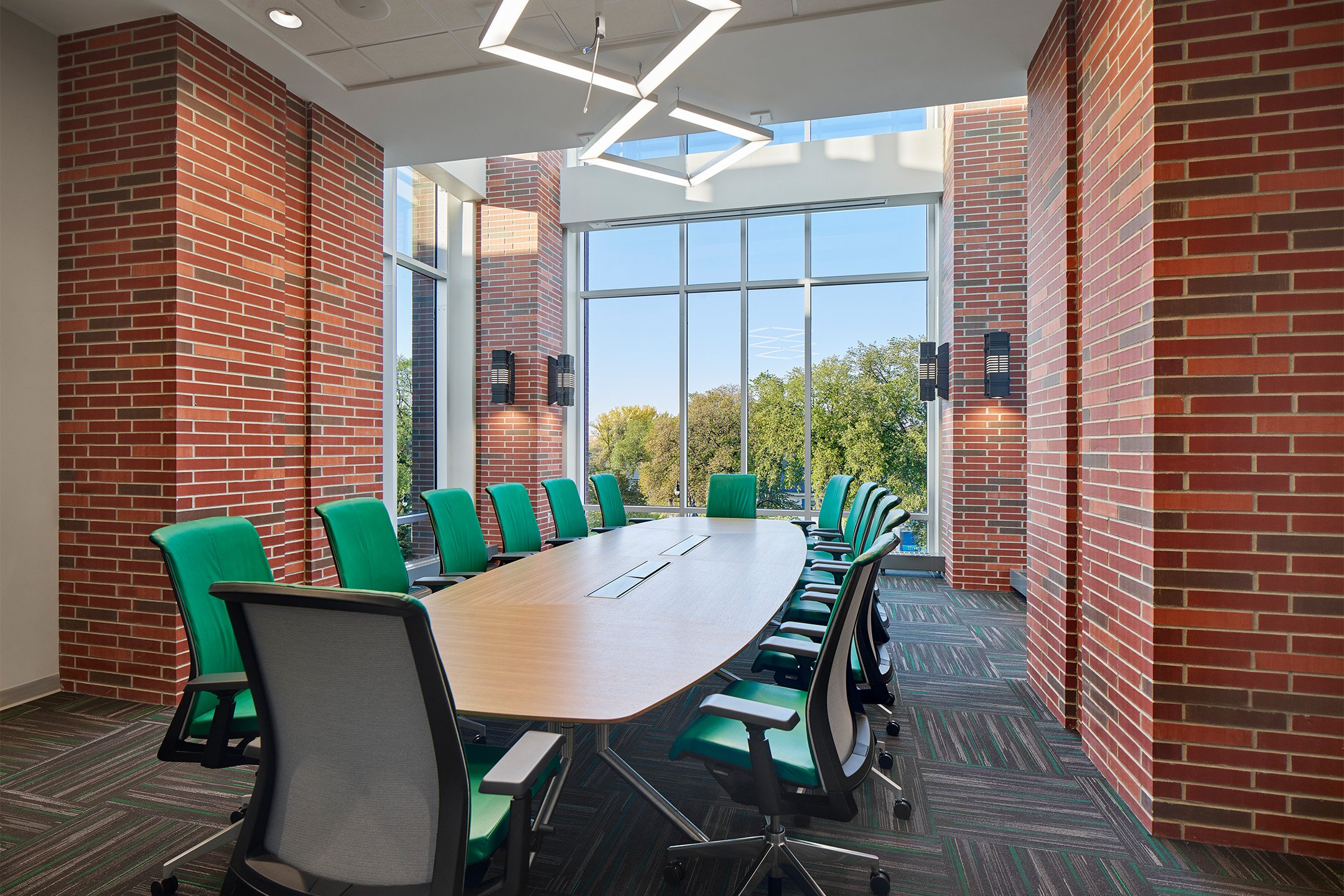 Haworth Very chairs in green upholstery in a conference room