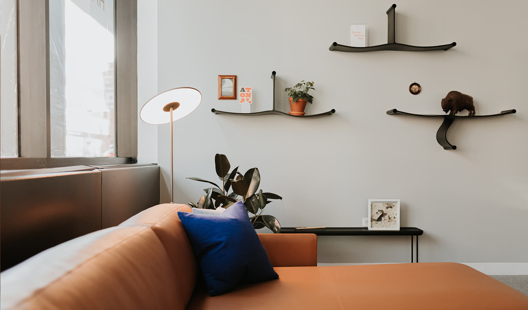 The range of products around this lounge application, such as the use of
Pablo Lighting and Cappellini shelving helps create a more intimate and
comfortable feel for a range of uses. .