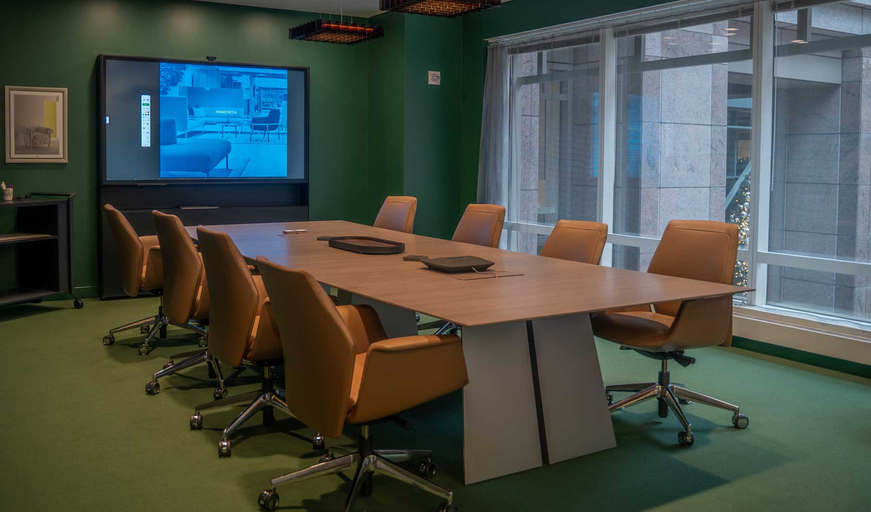Conference and Meeting space that supports both formal and strategic collaboration activities with a Bluescape screen and whiteboard space to share ideas and large window views to let in natural day light.
