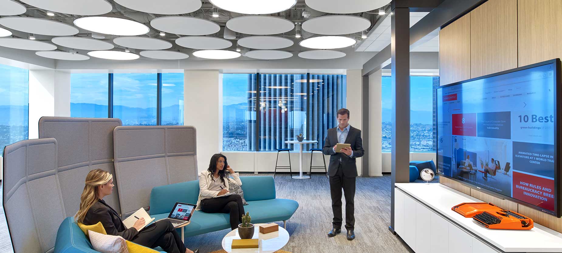 Informal meeting spaces in an open office environment are a great way to activate a workplace or kick off a meeting. Lighter scaled furniture and adjacent open space, centered on technology, provide flexibility to grow or contract seating as needed to accommodate various meeting sizes and postures.