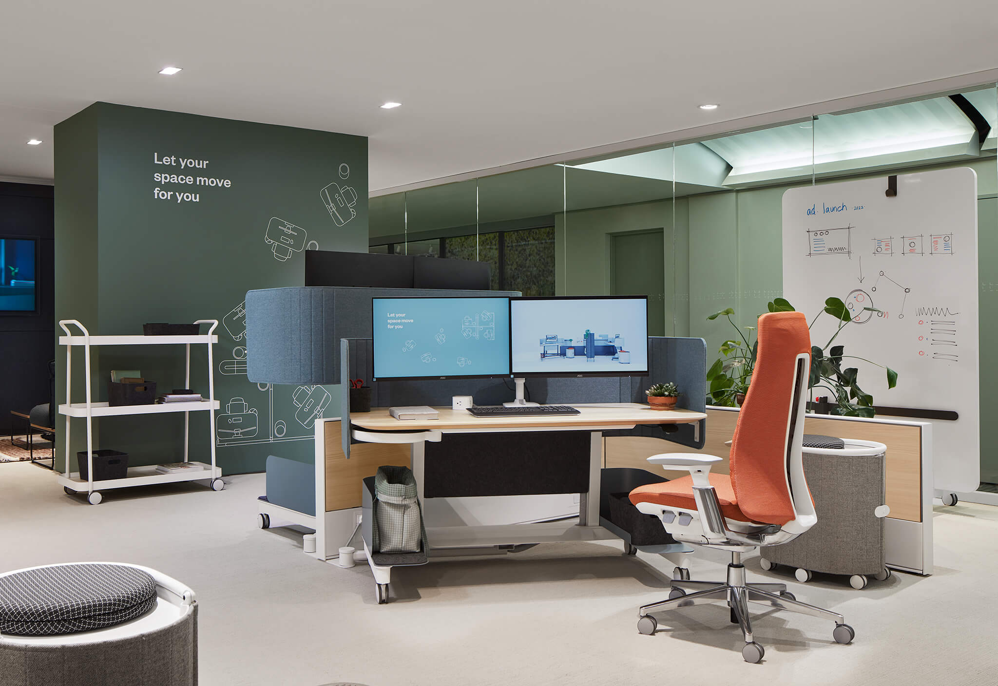 Haworth Fern chair in orange knit back placed at a workstation