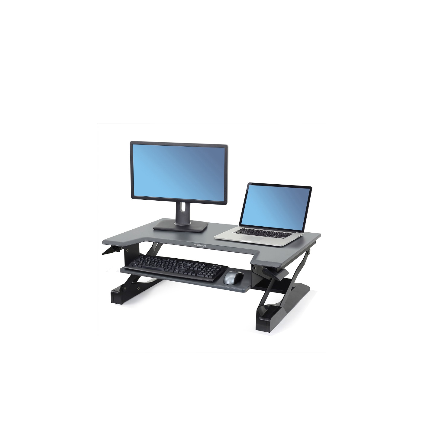 Haworth Sit Stand Work Station Accessories set up with keyboard, mouse, laptop, and monitor