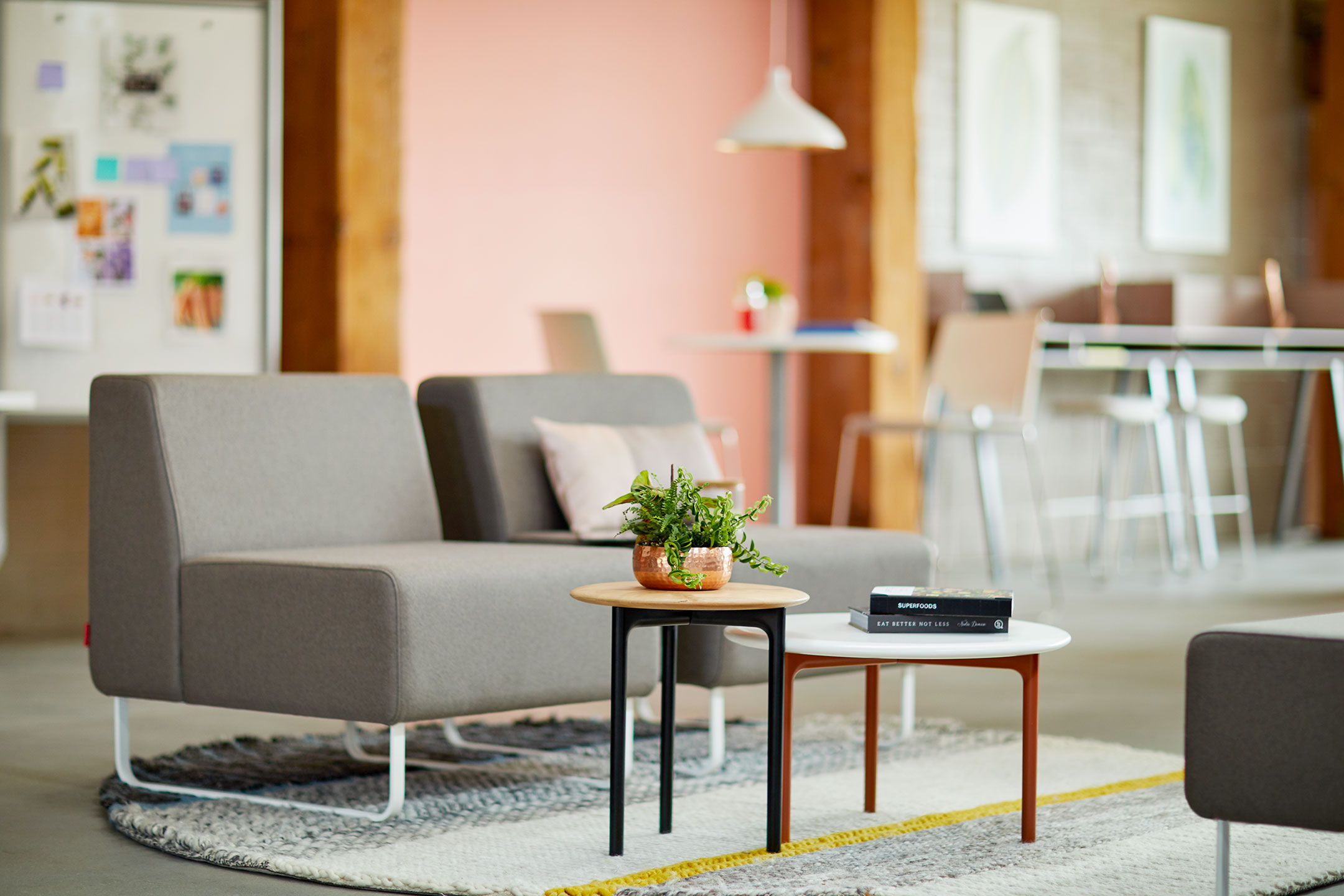 Haworth Openest Sprig Side Table in a office seating area used as a book table