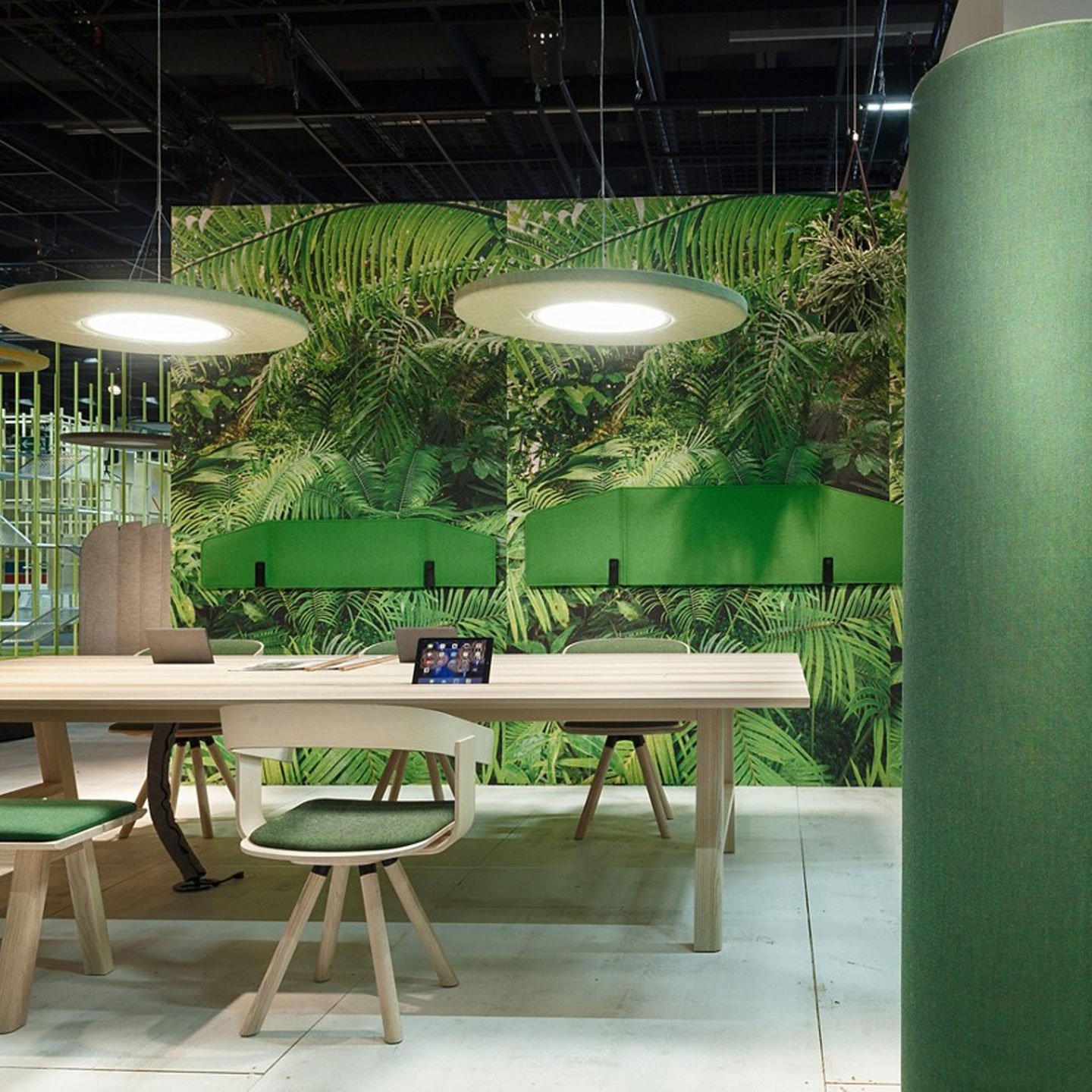 Haworth BuzziSkin Accessories Wallpaper with jungle fern design in a open office area with green chairs