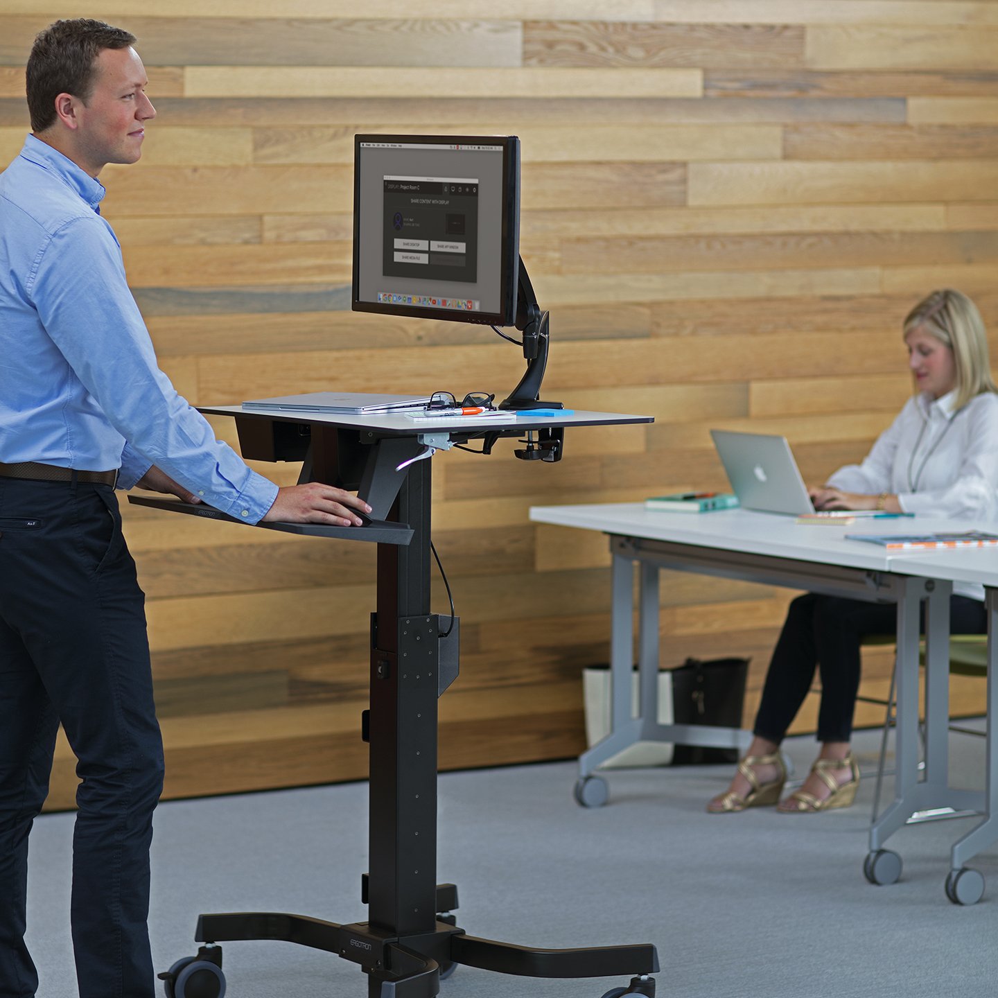 Haworth Mobile Cart Accessories used in conference room at front of room presenting a meeting 