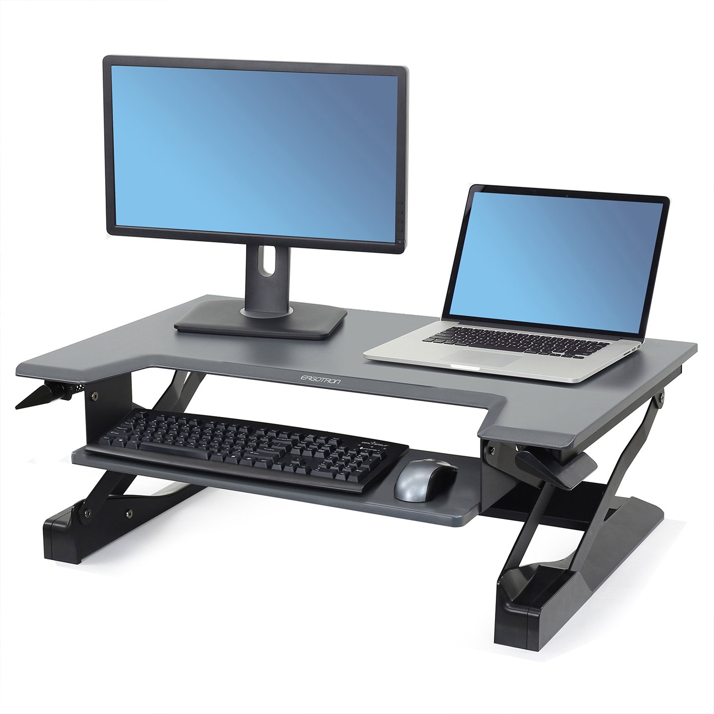 Haworth Sit Stand Work Station Accessories set up with keyboard, mouse, laptop, and monitor
