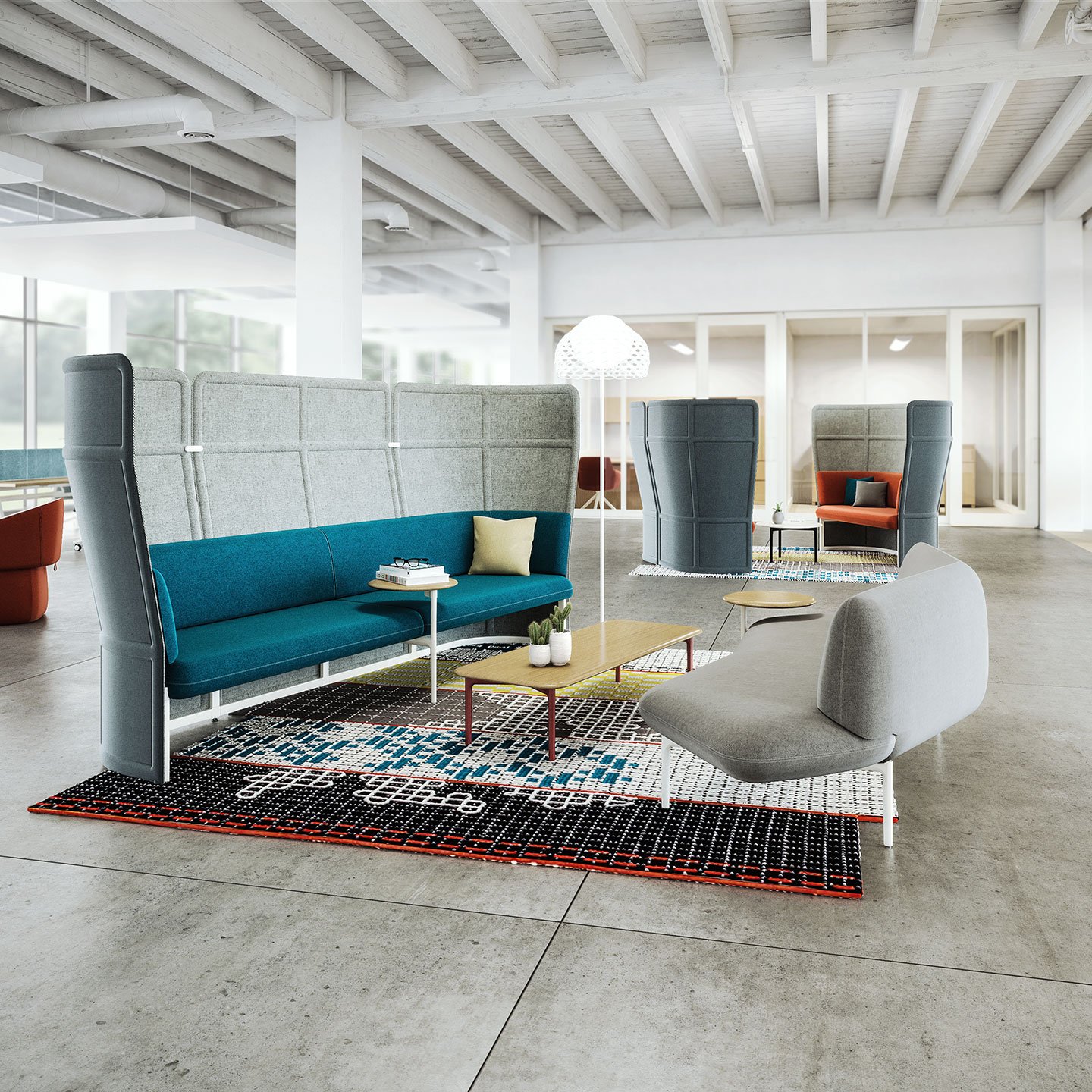 Haworth Openest Double Booth in grey color with blue seating and wood table in between with grey couch in open office space