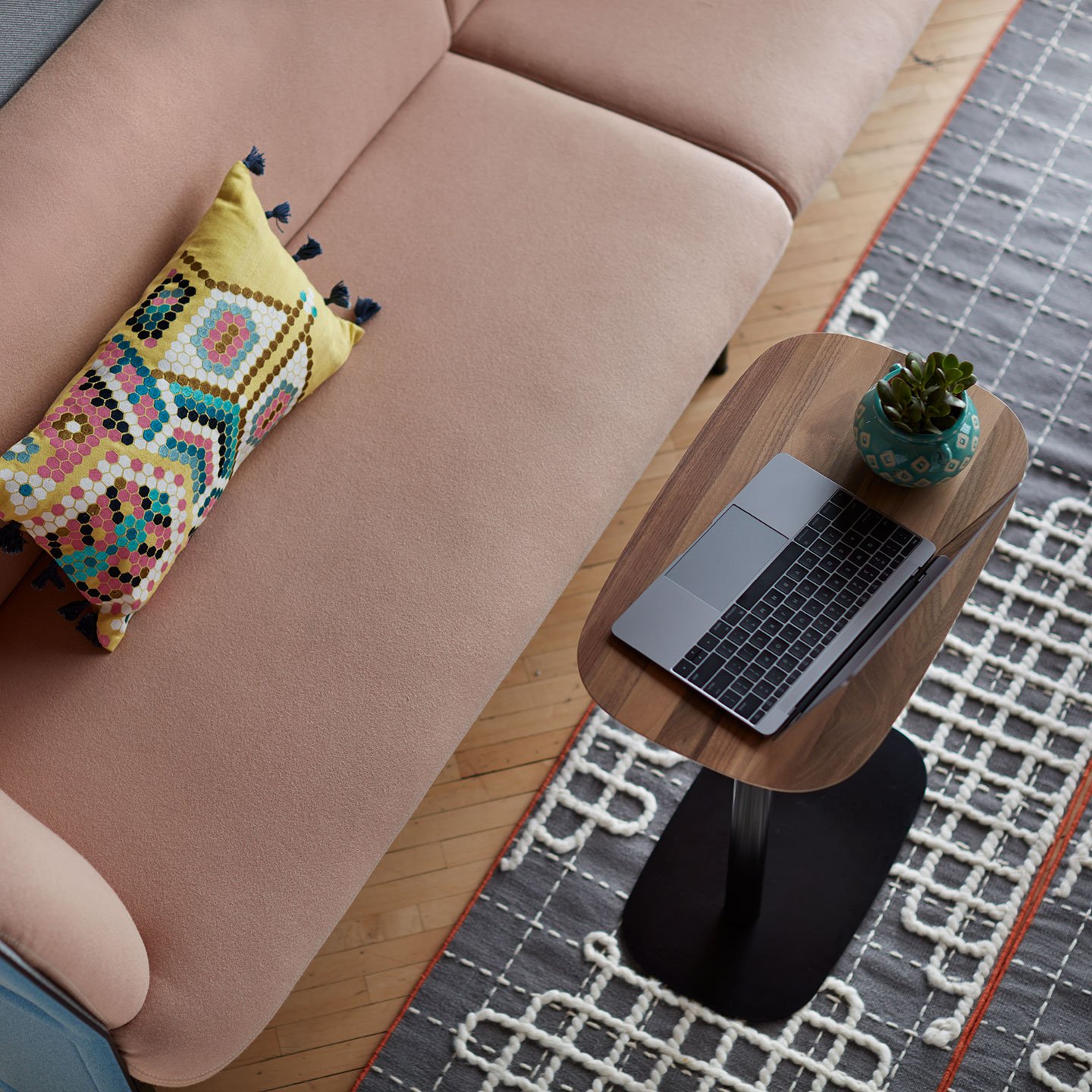 Haworth Openest Double Booth in grey color with tan seating and wood lap table on grey rug