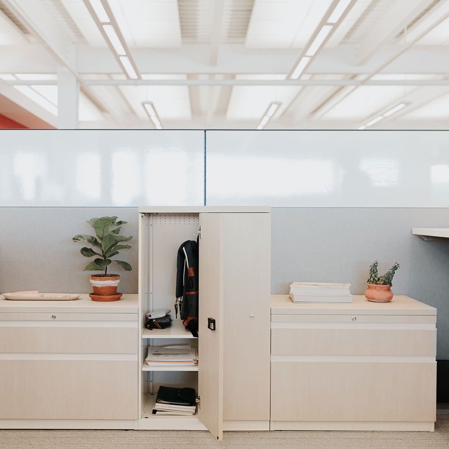 Haworth Compose Workspace with file cabinets and tall cabinet for storage
