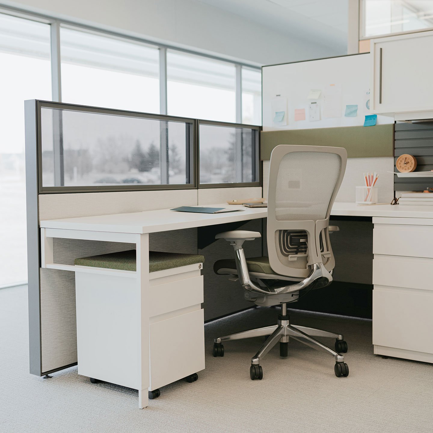 Haworth Compose Workspace in office area with a haworth chair and corner desk with dividers for privacy