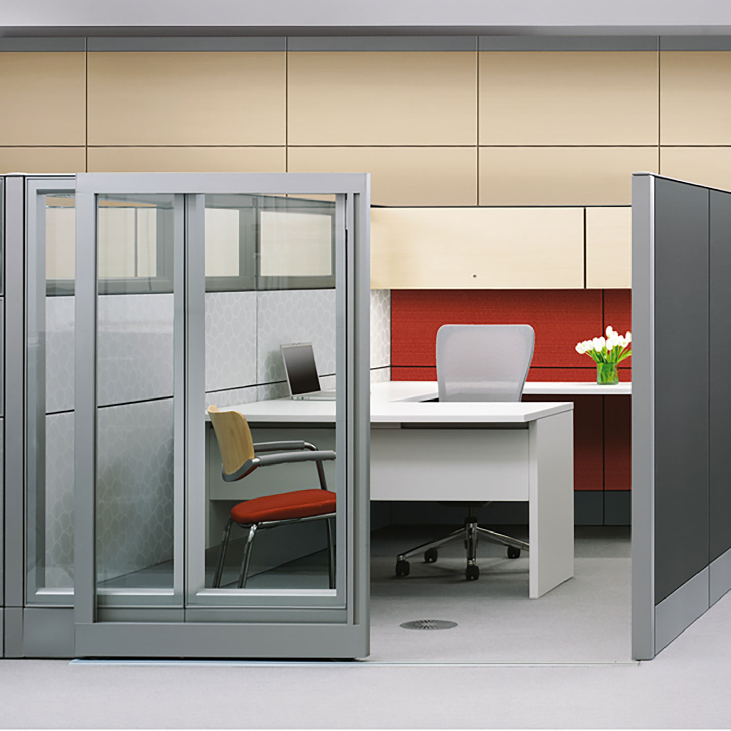 Haworth Premise Workspace in a private office space with a laptop at the desk