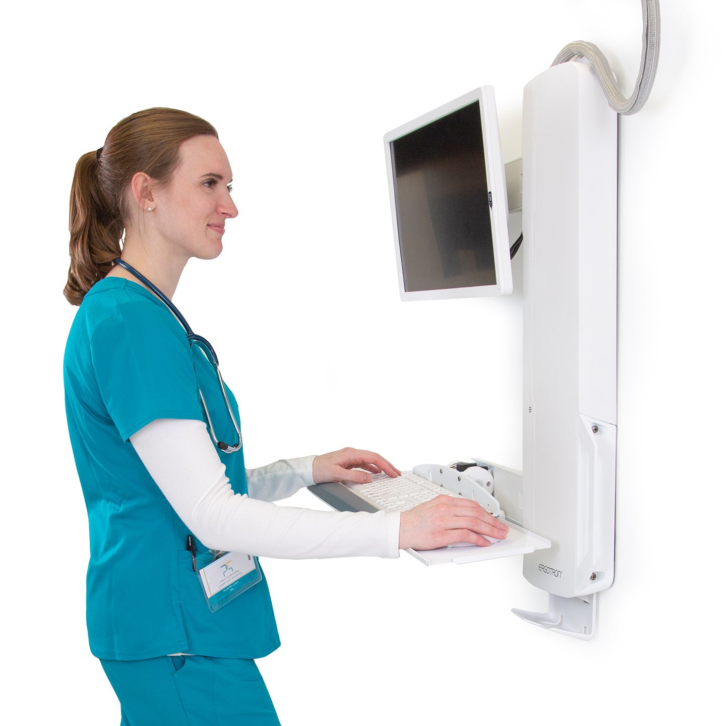 Haworth StyleView Sit to Stand Workspace in hospital mock up with nurse working at station in white color