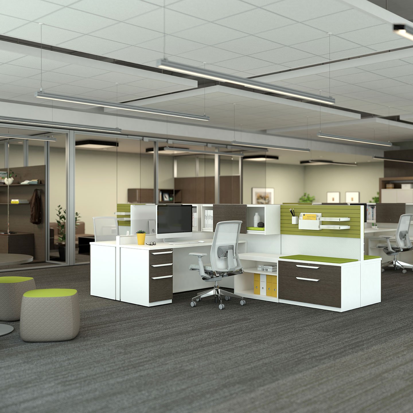 Haworth X Series Desks in white laminate in open office space with green dividers for privacy and grey chair at desk