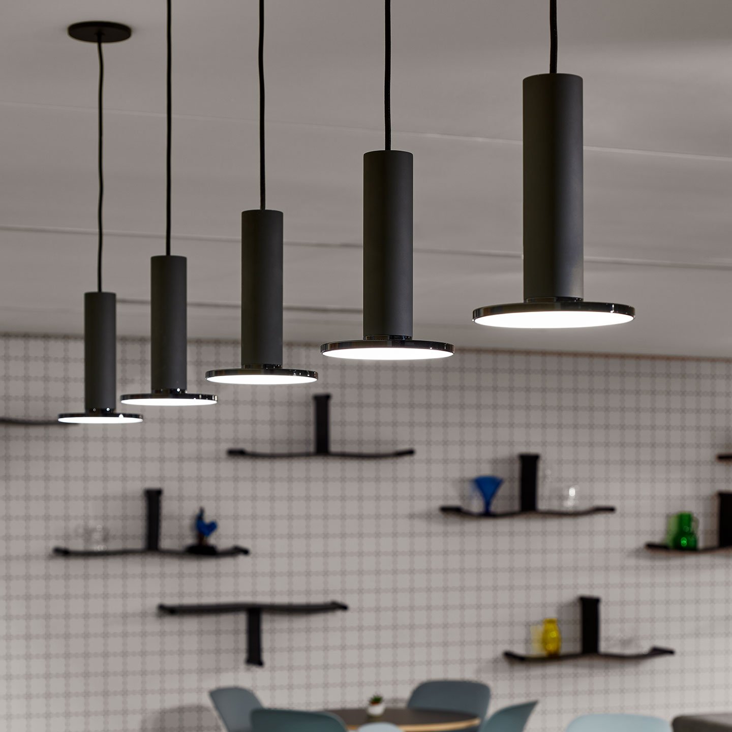 Haworth Cielo Lighting in black hanging from cieling in open office space with white walls