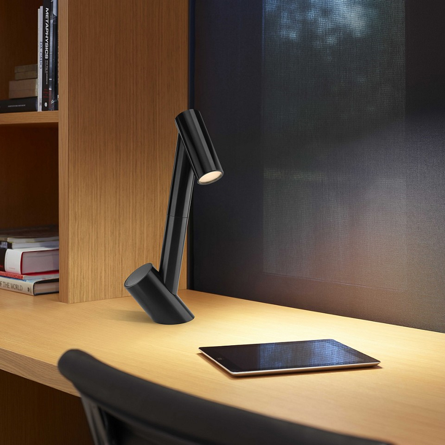 Haworth giraffa lighting in black color on wood office desk with tablet on desk