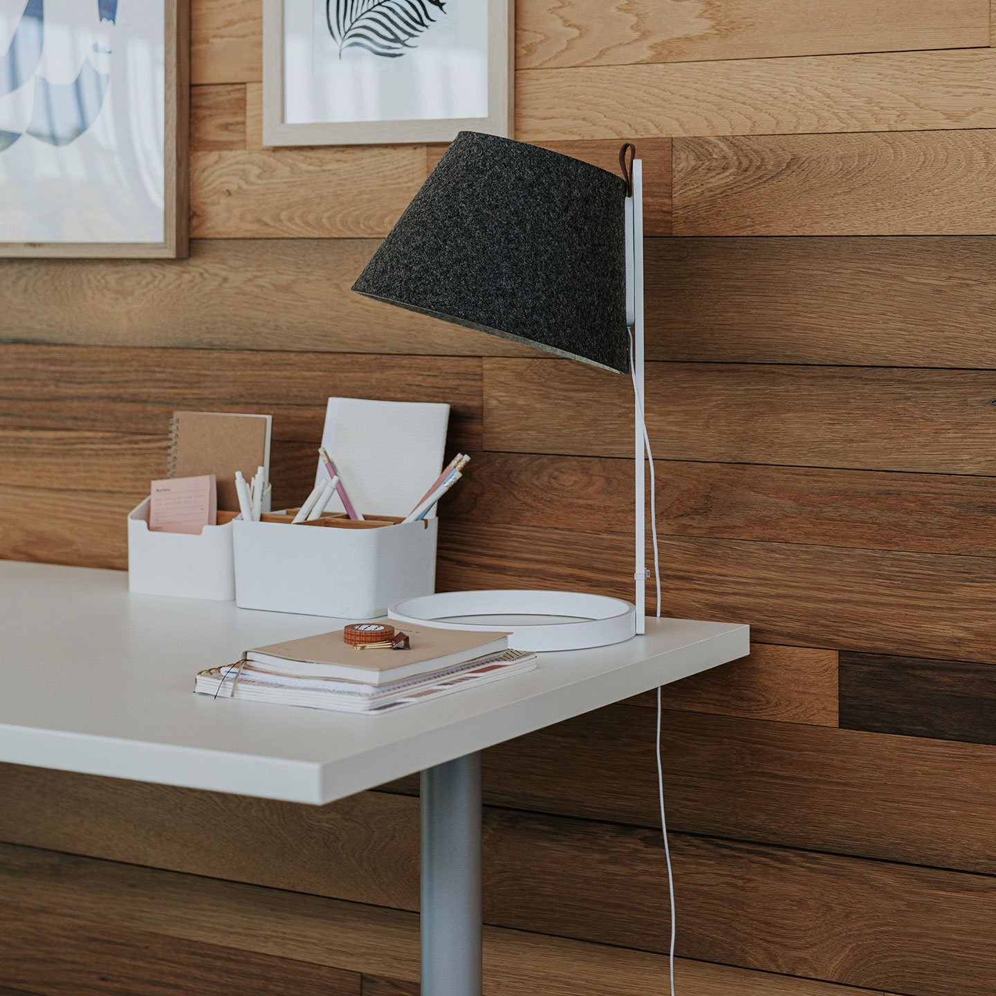 Haworth Lana Lighting desk lamp in black on white desk in office space