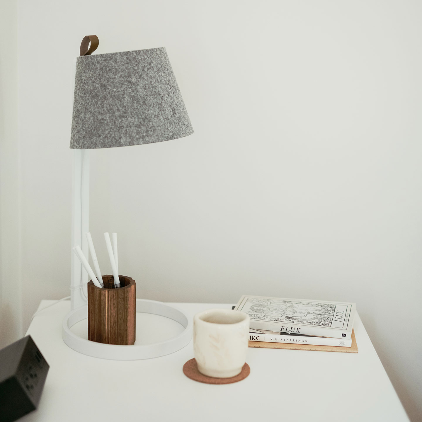 Haworth Lana Lighting grey desk lamp on white table