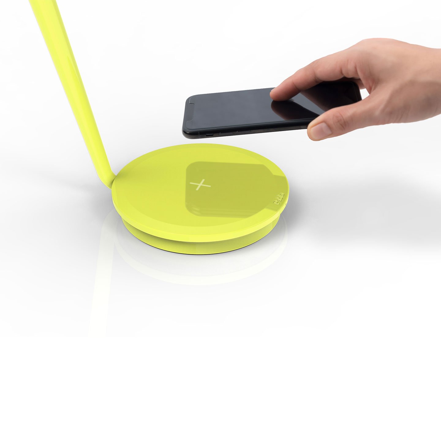 Haworth Pixo Plus Lighting in lime green color with phone being placed on charger pad