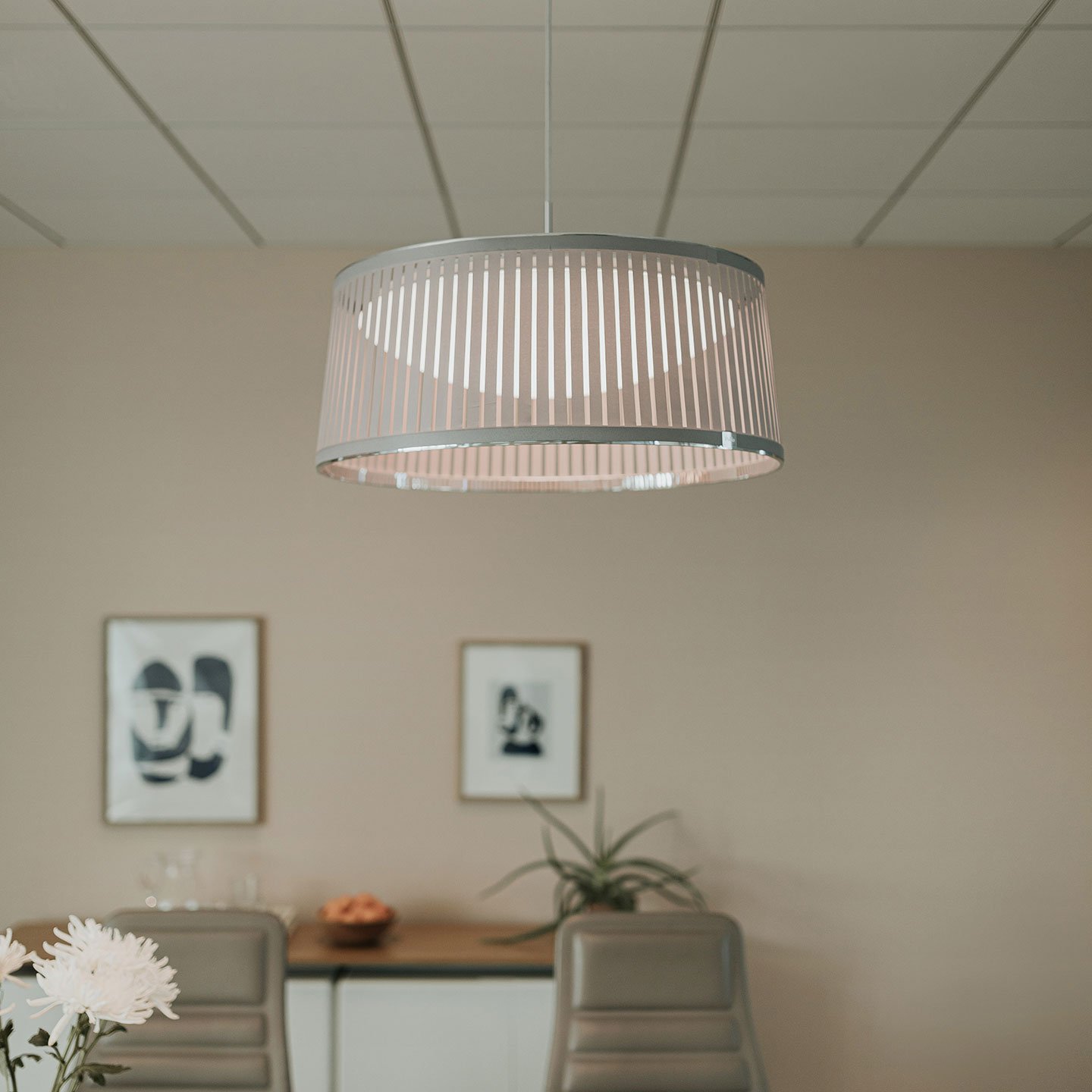 Haworth Solis Drum Lighting in white color above office meeting room table