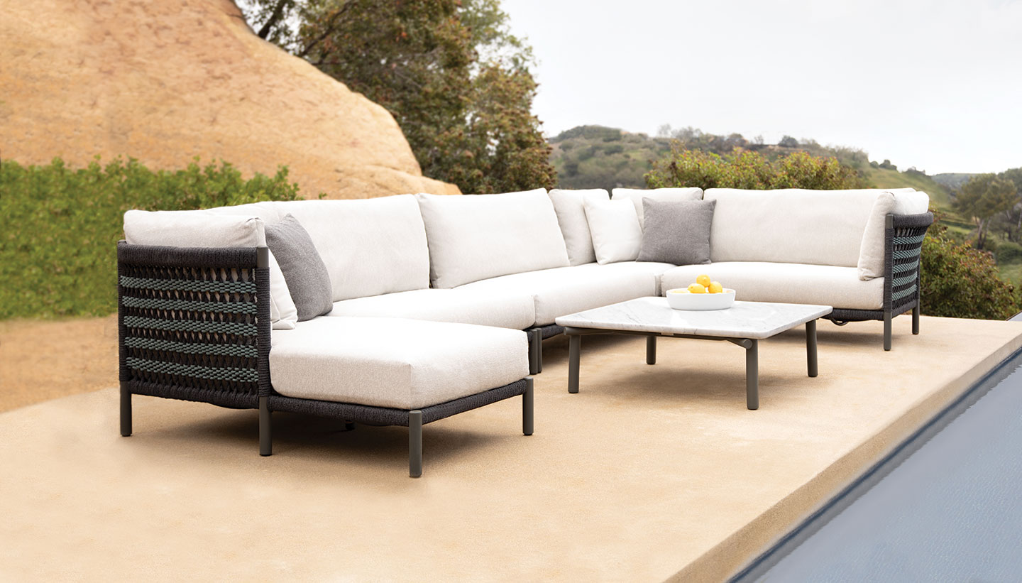 Haworth Anatra loung esofa with woven back and white upholstery in an open space