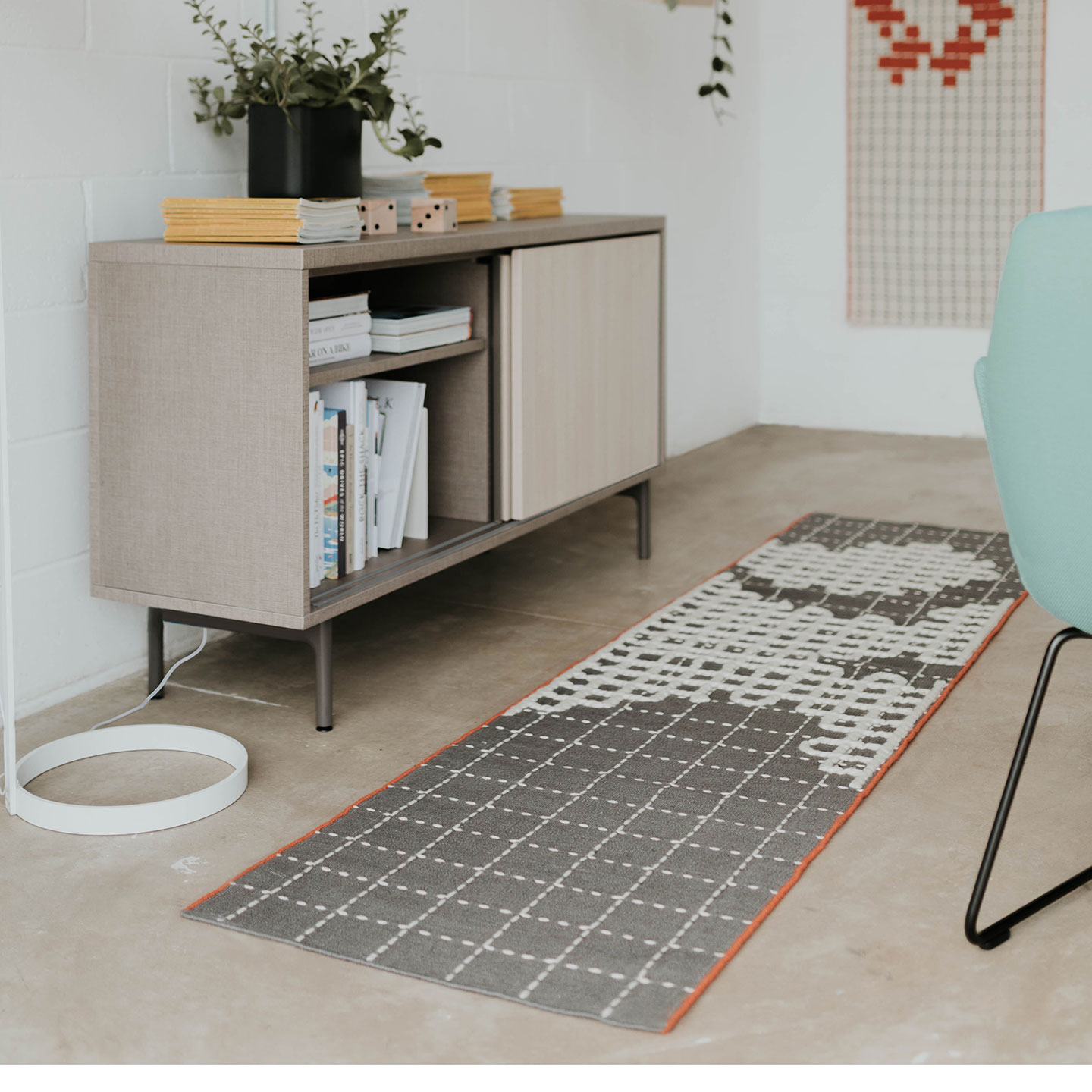 Haworth Bandas Space Rug in grey by office storage area and blue chair